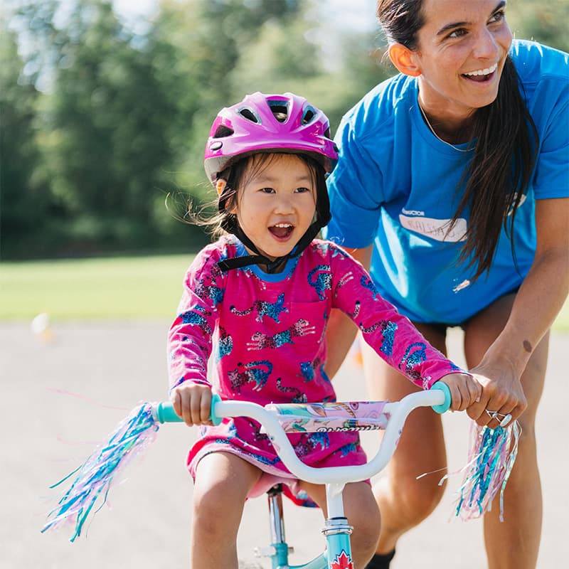 slider 2 girl riding bike at pedalheads bike camps in seattle washington